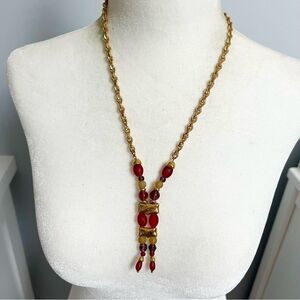Double strand beaded statement necklace on a gold tone chain